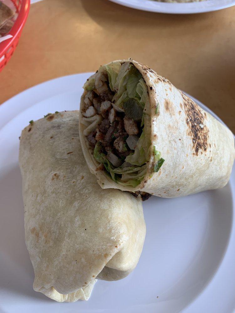 Mix Shawarma Wrap · Thin slices of chicken and beef marinated of special spices.