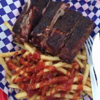BBQ Rib Meal for Two · Full rack St Louis style pork ribs (12 bones), choice of 2 large side dishes and 4 pieces of...