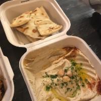 Meaty Hummus and Pita Combo · Topped with choice of gyro or chicken shawarma.