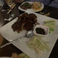 Peking Duck · Signature dish. Slowly roasted long island duck finished to crispy, juicy perfection. Served...