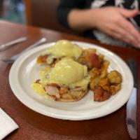 Shrimp and Bacon Benedict · 2 poached eggs on grilled shrimp and bacon and English muffin. Served with home fries and cr...