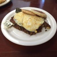 Irish Skillet · 2 eggs any style, grilled and chopped home fries mixed with grilled corned beef hash and top...