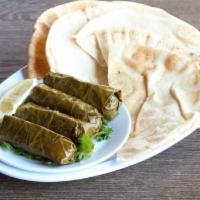 Grape Leaves · Stuffed with seasoned rice 4 pieces.