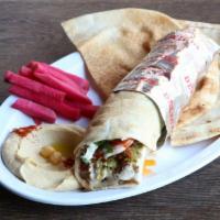 Falafel Wrap · Lettuce, tomatoes & tahini sauce served with pickled turnips & a side pick.