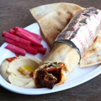 Beef Shawerma Wrap Combo · Beef strips, tomatoes, pickles, onions and tahini sauce.