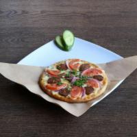 Sujuk Flat Bread · Beef sausage. Cheese topped with sujuk, tomatoes and onions.