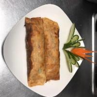 A4. Two Thai Chicken Spring Roll · Deep fried rolls stuffed with white meat chicken, cilantro, red pepper and onion. Served wit...