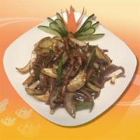 M2. Beef Mongolian Style · Onion and scallion stir-fried in a special Mongolian sauce. Hot and spicy.