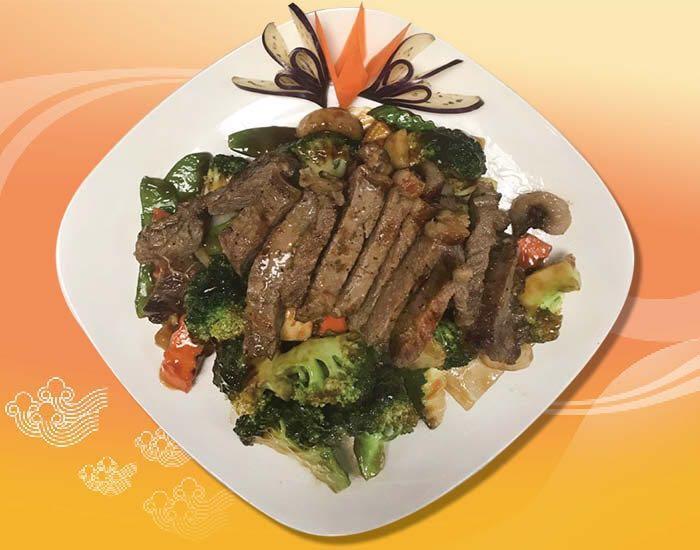 W1. Grilled Steak Asian Style · Tender steak cut in thick slices, perfectly grilled and seasoned and accompanied with mixed vegetable.