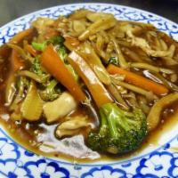 Skinny Noodle with Gravy · Pan- fried skinny noodles covered with chicken mushrooms, broccoli, bamboo shoots baby corn ...
