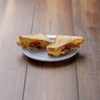 B3. 2 Eggs with Meat and Cheese Sandwich · 