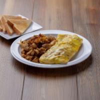 B23. Western Omelet Platter · 3 eggs, ham, American cheese, tomato, onions and green peppers.