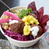 Falafel Bowl SMALL · This is the falafel bowl: a small bowl has three balls, and is in a small upright bowl.  The...