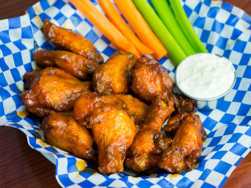 Traditional Wings Basket · Dave's traditional wings specially-seasoned and tossed in your choice of sauce: Rich & Sassy® (Mild), Buffalo (Medium), , Devil's Spit® (Hot) or Wilbur's Revenge® (XXX Hot). Served with  celery sticks and bleu cheese dressing on the side.