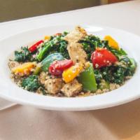 Quinoa Fiesta Salad · Nutrient-packed, warm salad made with a medley of organic red and white quinoa, kale, red an...
