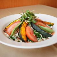 Kale-fornia Salad · Kale, diced tomato, onions, cilantro, carrots, avocado, organic red and white quinoa, and gr...