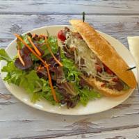 Taste of Philly · Soy steak strips, vegan mozzarella cheese, red and green bell peppers, and house-made mayo o...