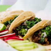 Pollo Tacos · Three soft shell tacos served with rice, beans, pico de gallo, guacamole, salsas and grilled...