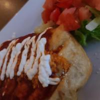 Ground Beef Chimichanga · Deep-fried flour tortilla wrap filled with beans, onions ad cheese served with rice and bean...