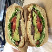 Avocado BLT Sandwich · Smoked bacon, avocado, lettuce, tomatoes and mayo on a toasted ciabatta.