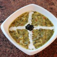 Ash Reshteh (Soup) · This delicious persian soup is made with wheat noodles and a variety of fresh herbs, lentils...
