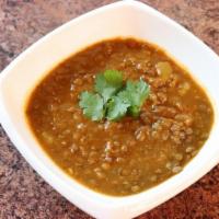Addassee (Soup) · This homemade soup is prepared with lentil beans and sauteed onions in tomato based sauce/br...