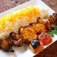 Chicken with Bone Kabob · A skewer of marinated whole Cornish Game Hen charbroiled to perfection - 2 pieces of each: B...
