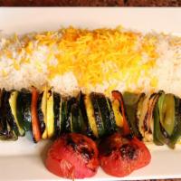 Veggie Kabob · A skewer of marinated mushrooms, zucchini, bell peppers, onions, carrots, and yellow squash....