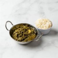 48. Saag Paneer · Spinach cooked with broccoli homemade cheese and ground spices. Vegetarian.