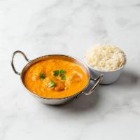 60. Paneer Tikka Masala · Paneer cooked with chopped bell pepper, onions, tomato sauce, and Indian spices with creamy ...
