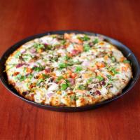 Veggie Supreme Pizza · Mushrooms, bell peppers, onions, tomatoes, olives, mozzarella cheese and red sauce.