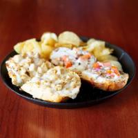 Garlic Chicken Sandwich · Chicken, tomatoes, onions, mushrooms, melted cheese and creamy garlic sauce. Toasted and ser...