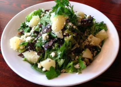 Chopped Gorgonzola Pear Salad · Gorgonzola, pears, candied walnuts, cranberries tossed with house made sweet pear dressing.