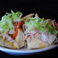 8. Oven Roasted Sliced Turkey Sub Sandwich · Cold turkey breast, lettuce, tomatoes and mayo.