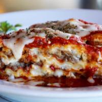Lorrie's Lasagna · Ricotta, Italian sausage, ground beef, marinara sauce, mozzarella and pecorino.