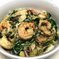 Shrimp Fettuccine · Egg and spinach noodles tossed with garlic shrimp, mushroom, red onions, spinach blended wit...