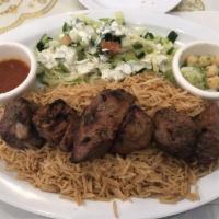Teka kabob · 6 tender pieces of tri tip steak charbroiled to perfection. All kabobs served with rice, sal...
