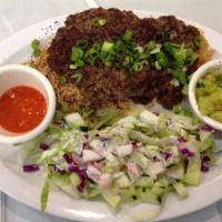 Chapli Kabob · 2 patties of the seasoned ground beef. All kabobs served with rice, salad and shor nakhod. A...