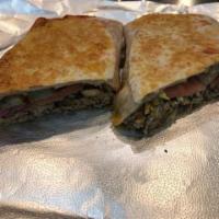 Beef & Lamb Gyro Wrap  · Lamb & Beef Gyro, seared on a gas flame wrapped with lettuce, tomatoes, onions, feta cheese,...