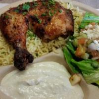 1/4 Chicken Plate · White or dark meat served with rice or pita or fries, salad and garlic sauce.
