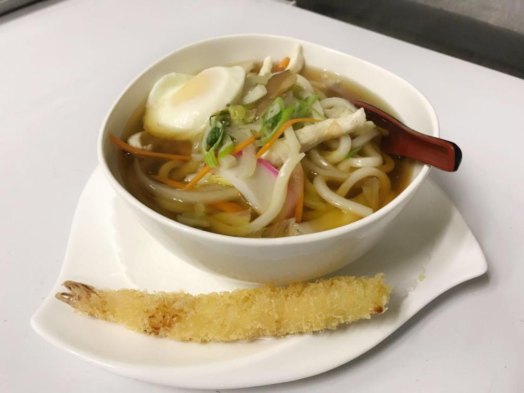 Nabe Yaki Noodles · Noodle soup with chicken, vegetable, egg and 1 piece of shrimp tempura.