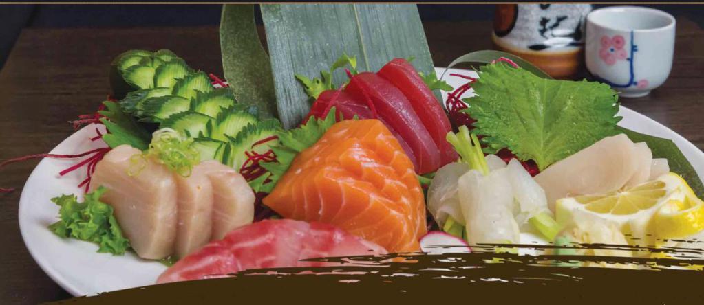 Sashimi Deluxe · 18 pieces sashimi and rice.