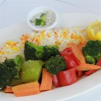 Steamed Vegetables with Saffron Rice · Mixed vegetables sauteed in lemon pepper. Veggie.
