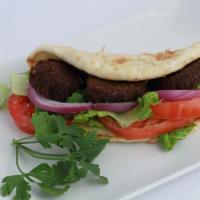 Falafel Sandwich · Vegetable patties. Fried patties made from ground chickpeas and spices served with lettuce, ...