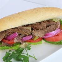 Zaban Sandwich · Mildly seasoned beef tongue served with lettuce, tomatoes, pickles, onions and mayonnaise on...