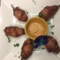 Stuffed Jalapenos · Fried pickled jalapenos stuffed with cheese and shrimp wrapped in bacon.