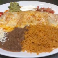 Mi Rancho Burrito · A 10 inch flour tortillas stuffed with vegetables and your choice of filling served with gua...