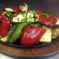Grilled Vegetables Fajitas · Roasted pepper and onion, served with rice and beans. Side of guacamole, pico de gallo, sour...