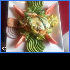 Salmon Relleno · Fresh butterfly-cut grilled salmon with spinach, onions, peppers, mushrooms and melted cheese. Served over our fresh avocado salad.