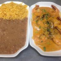 Camarones Al Chiptole · sauteed jumbo shrimp with mushrooms and chipotle cream sauce rice and beans on the side